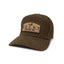 Waxed Canvas 7-Panel Hunting Hat with leather strap and brass clasp, heavyweight construction built for waterfowl hunters, front view